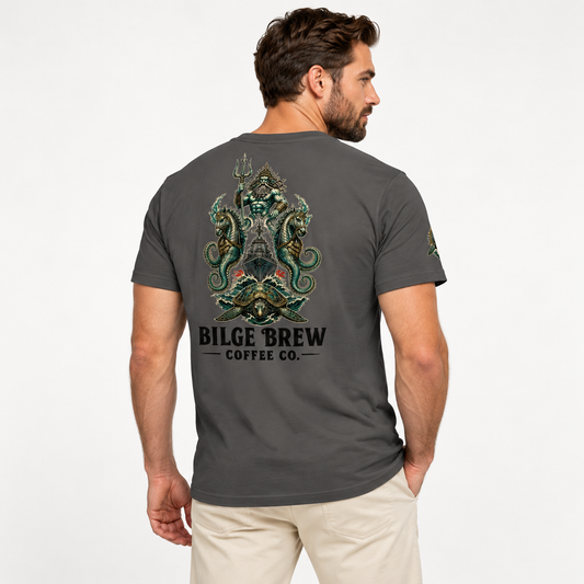 A man wearing a dark gray t-shirt with a large green and black dragon graphic and 'BILGE BREW COFFEE CO.' text on the back, shown from a three-quarters view against a light gray background.