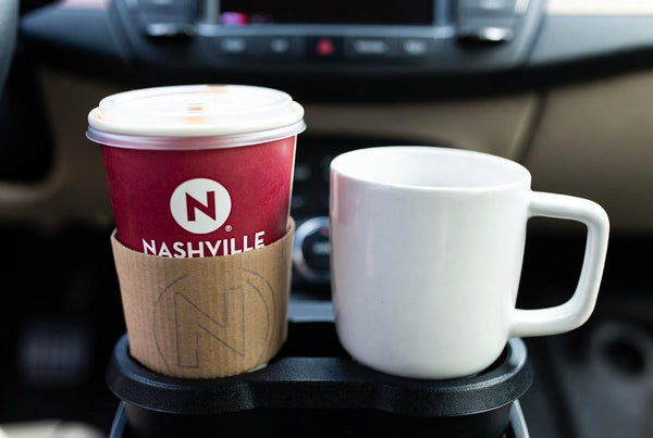 Drive-thru coffee cup in car holder vs home brewed mug