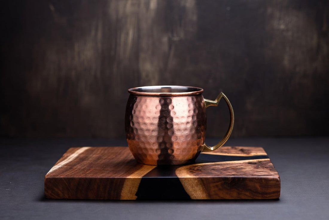 copper mug on dark walnut