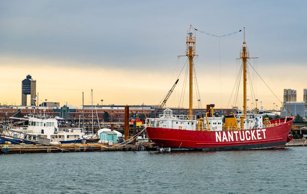 red and white boat on sea during daytime