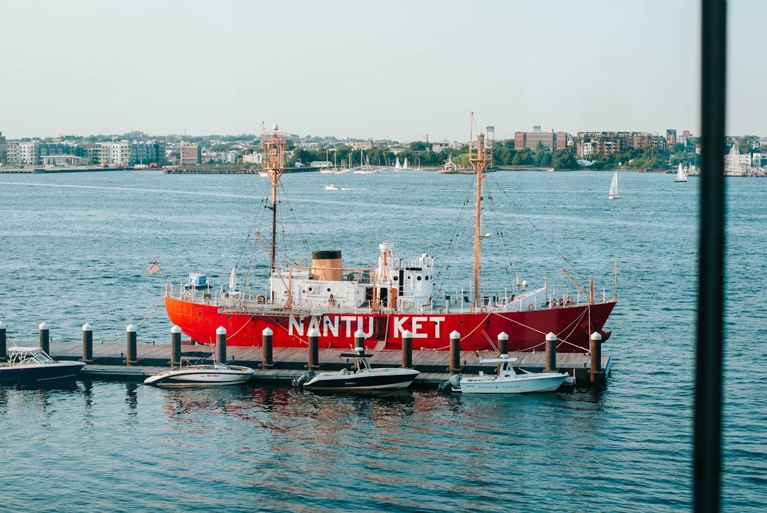 red and white boat on sea during daytime
