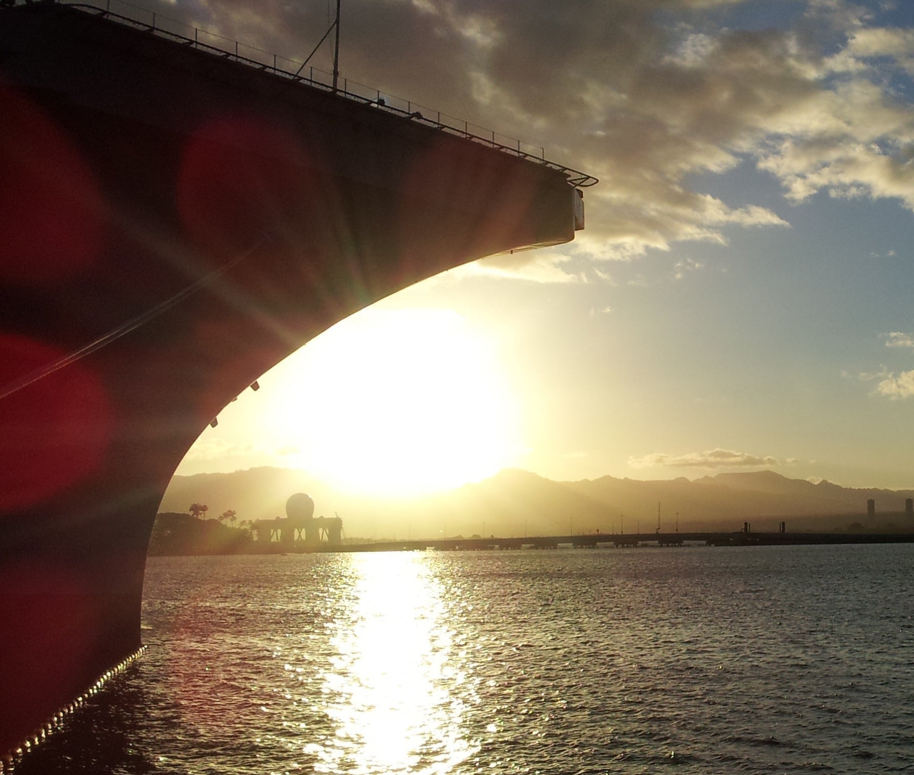 US NAVY CARRIER AT SUNSET
