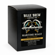 A black square coffee box for Bilge Brew Coffee Co. Maritime Roast Breakfast Blend, featuring a graphic of two dolphins facing a submarine on the front label.