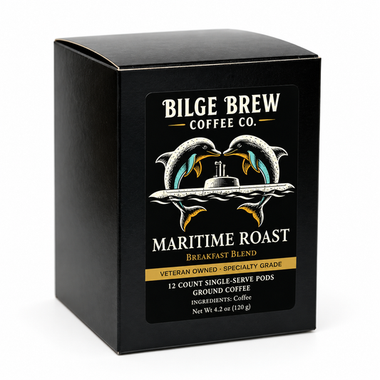 A black square coffee box for Bilge Brew Coffee Co. Maritime Roast Breakfast Blend, featuring a graphic of two dolphins facing a submarine on the front label.