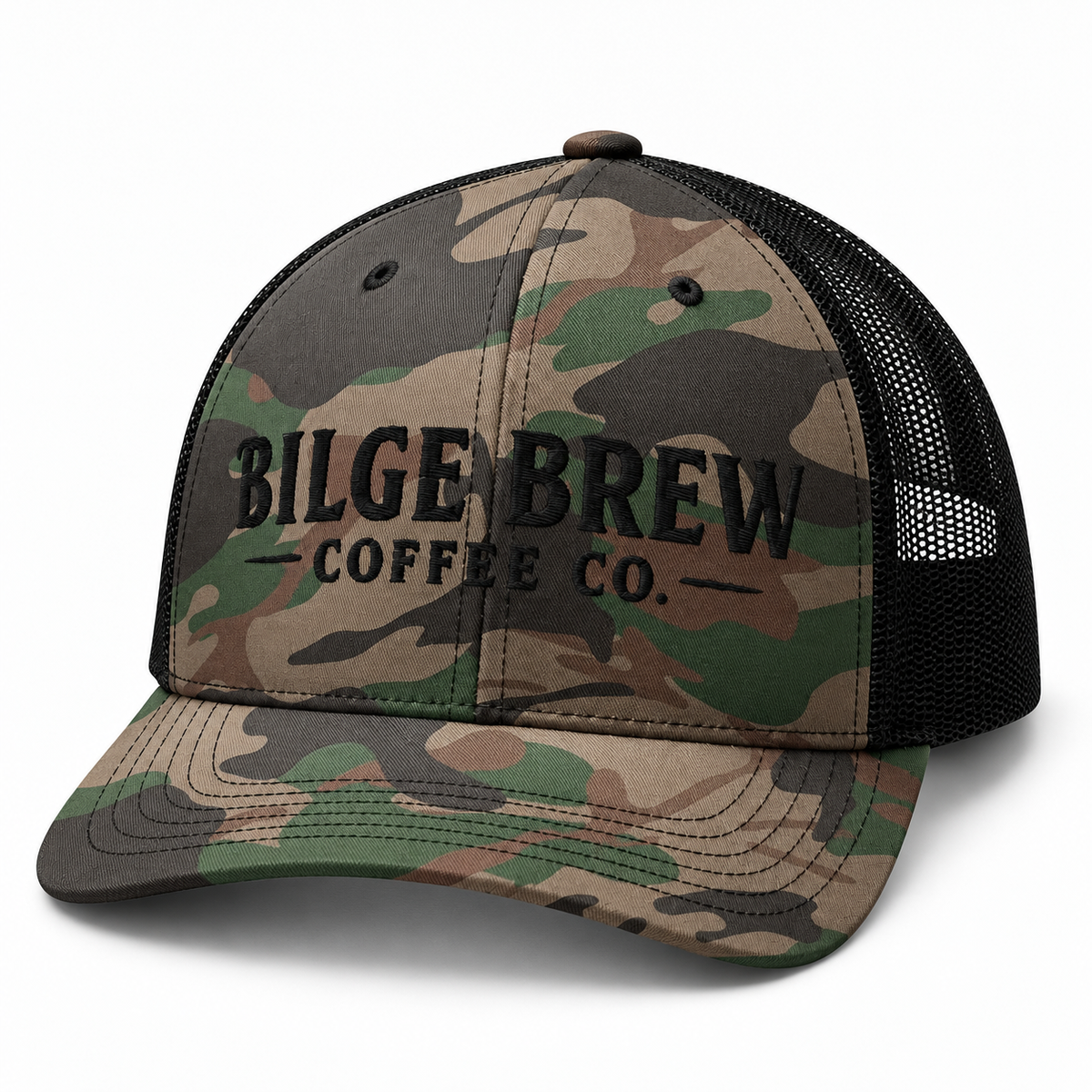 A camouflage trucker hat with black mesh back panels and black embroidered text reading 'BILGE BREW COFFEE CO.' on the front, shown on a clean white background.