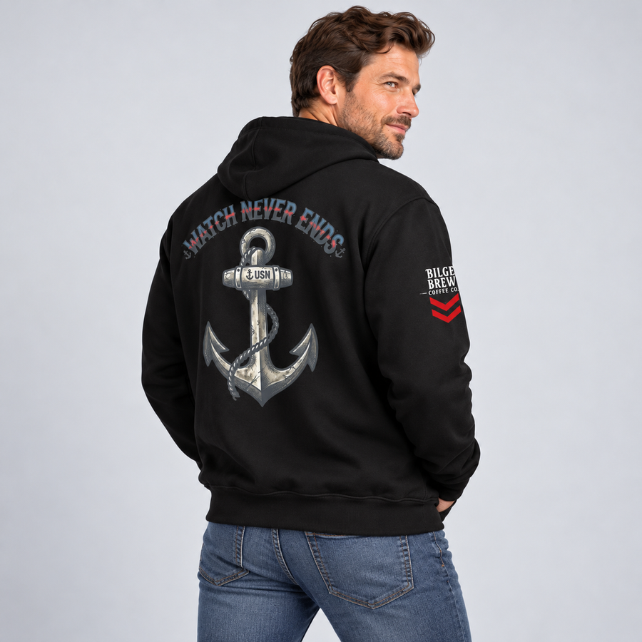 A man wearing a black hoodie from the back, featuring a large silver anchor graphic with the words 'WATCH NEVER ENDS' and a red and white 'BILGE BREW' logo on the left sleeve, set against a light gray studio background.