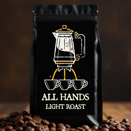 ALL HANDS — Light Espresso Roast: Bilge Brew All Hands light espresso roast coffee bag on coffee beans, smooth balanced light roast