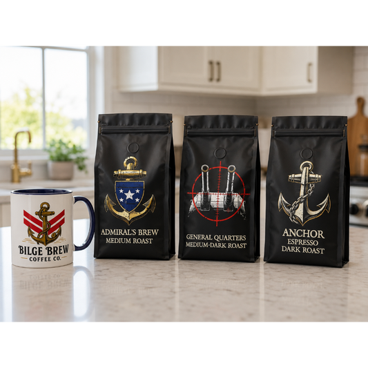 Three black coffee bags with nautical anchor graphics are lined up on a kitchen counter next to a white ceramic mug printed with 'BILGE BREW COFFEE CO.' The bags are labeled Admiral's Brew Medium Roast, General Quarters Medium-Dark Roast, and Anchor Espresso Dark Roast.