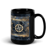 Black mug with a compass design on a white background