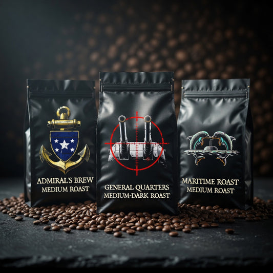 Three coffee bags with different designs and text on a dark surface with coffee beans.