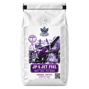 JP-5 Jet Fuel is Bilge Brew's darkest Italian-style roast, with a deeply roasted, smoky, full-bodied cup. Available whole bean or ground for drip brewing.