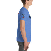 Person wearing a blue t-shirt with a logo on a white background