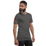 Man wearing a dark gray t-shirt with a logo on a white background