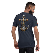 Man wearing a navy blue t-shirt with a large anchor design on the back, on a white background.