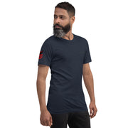 Man wearing a dark blue t-shirt with a red logo on a white background