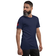 Man wearing a navy blue t-shirt with a logo on a white background