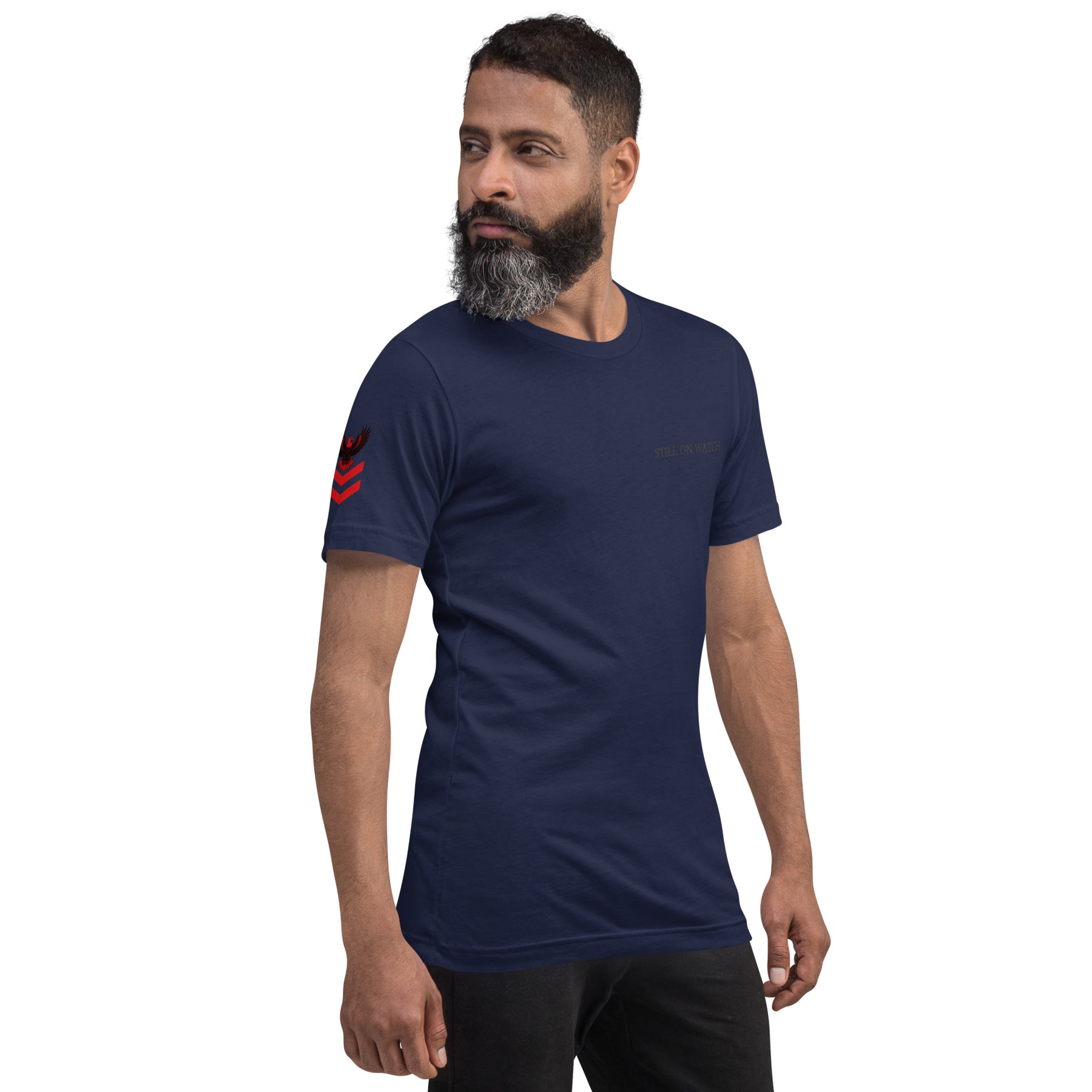Man wearing a navy blue t-shirt with a logo on a white background