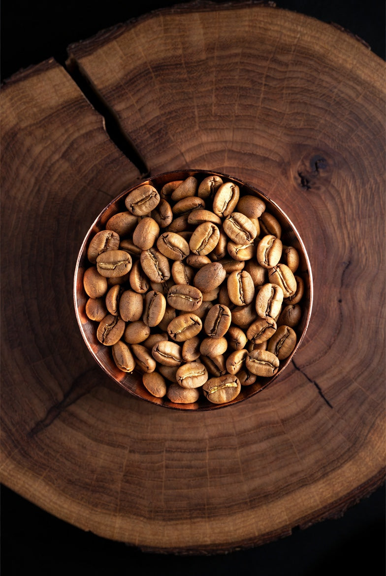 Cup of coffee beans on a wooden surface