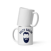 Two white mugs stacked on a white background, with one displaying 'Salty Sailor' text and a beard graphic.